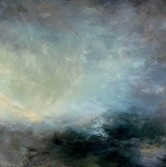 Dark sky and green coast with sun showing on left