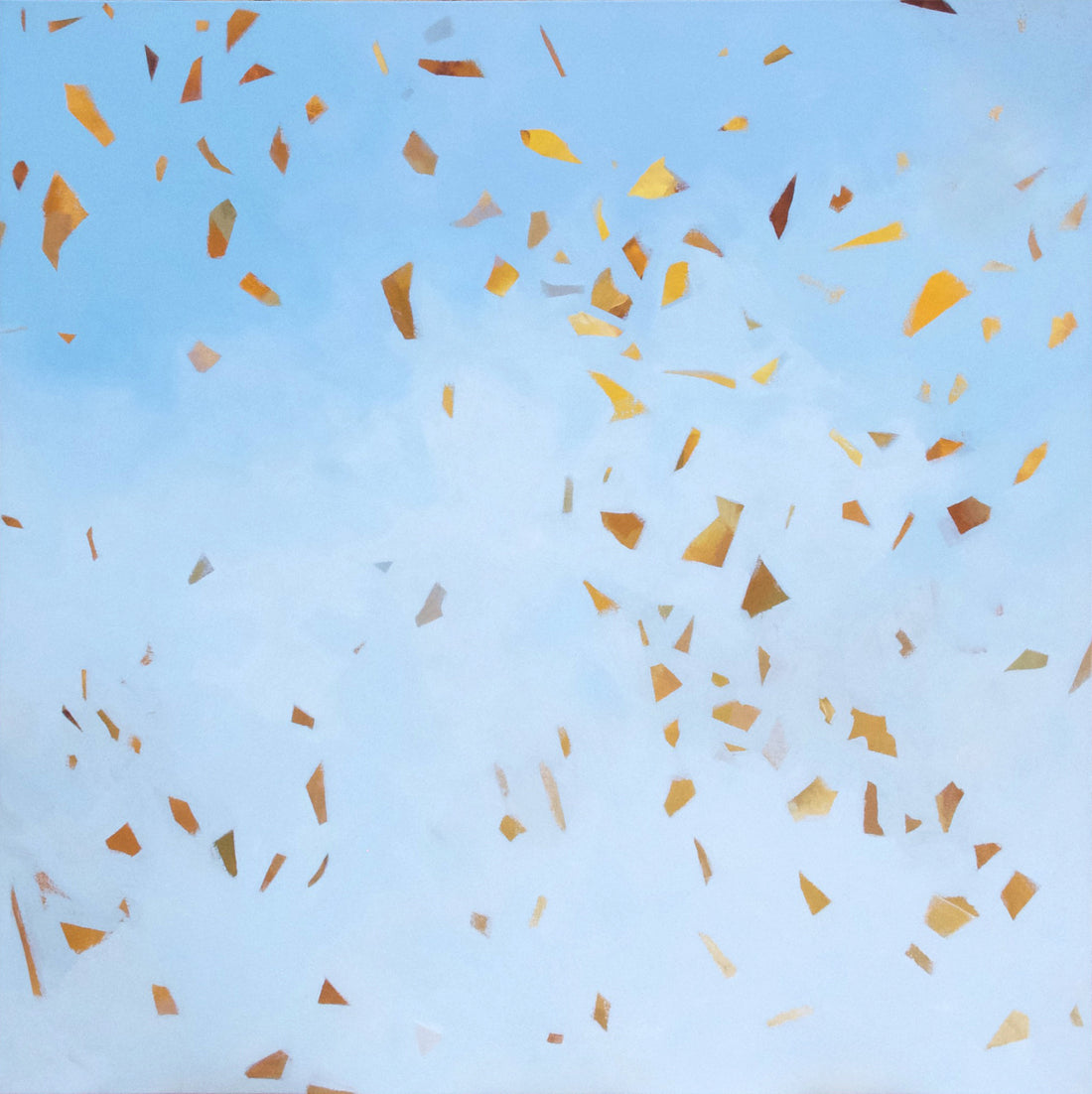 Gold abstract confetti on blue sky background