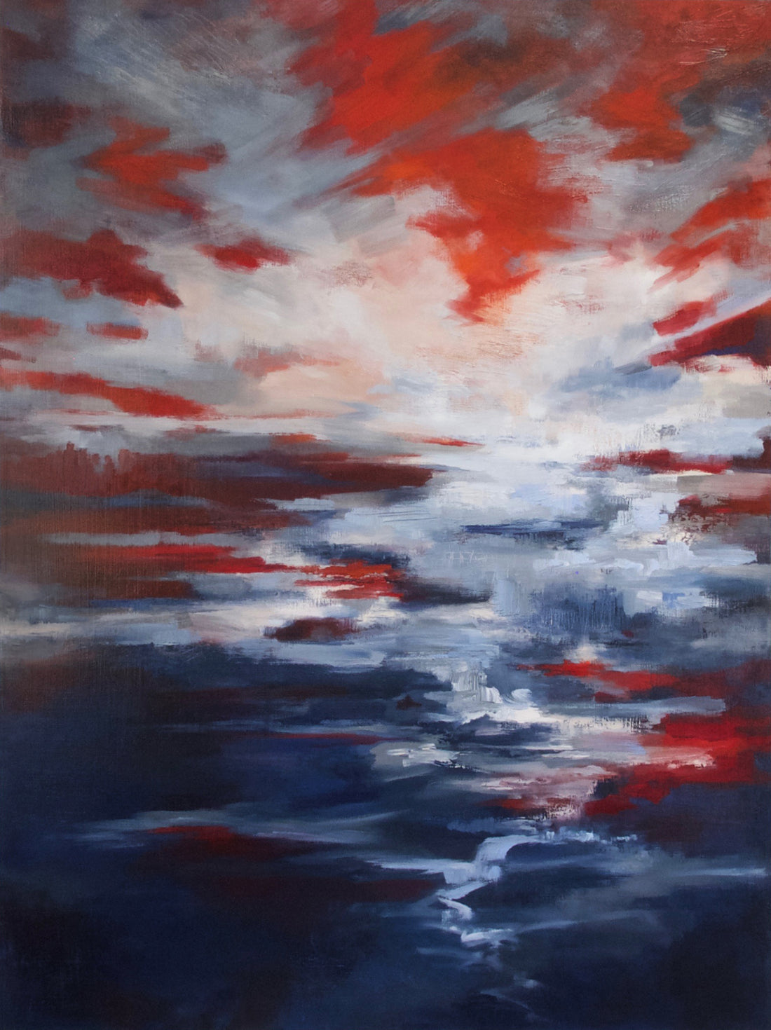 Abstract sunset with navy water and red sky